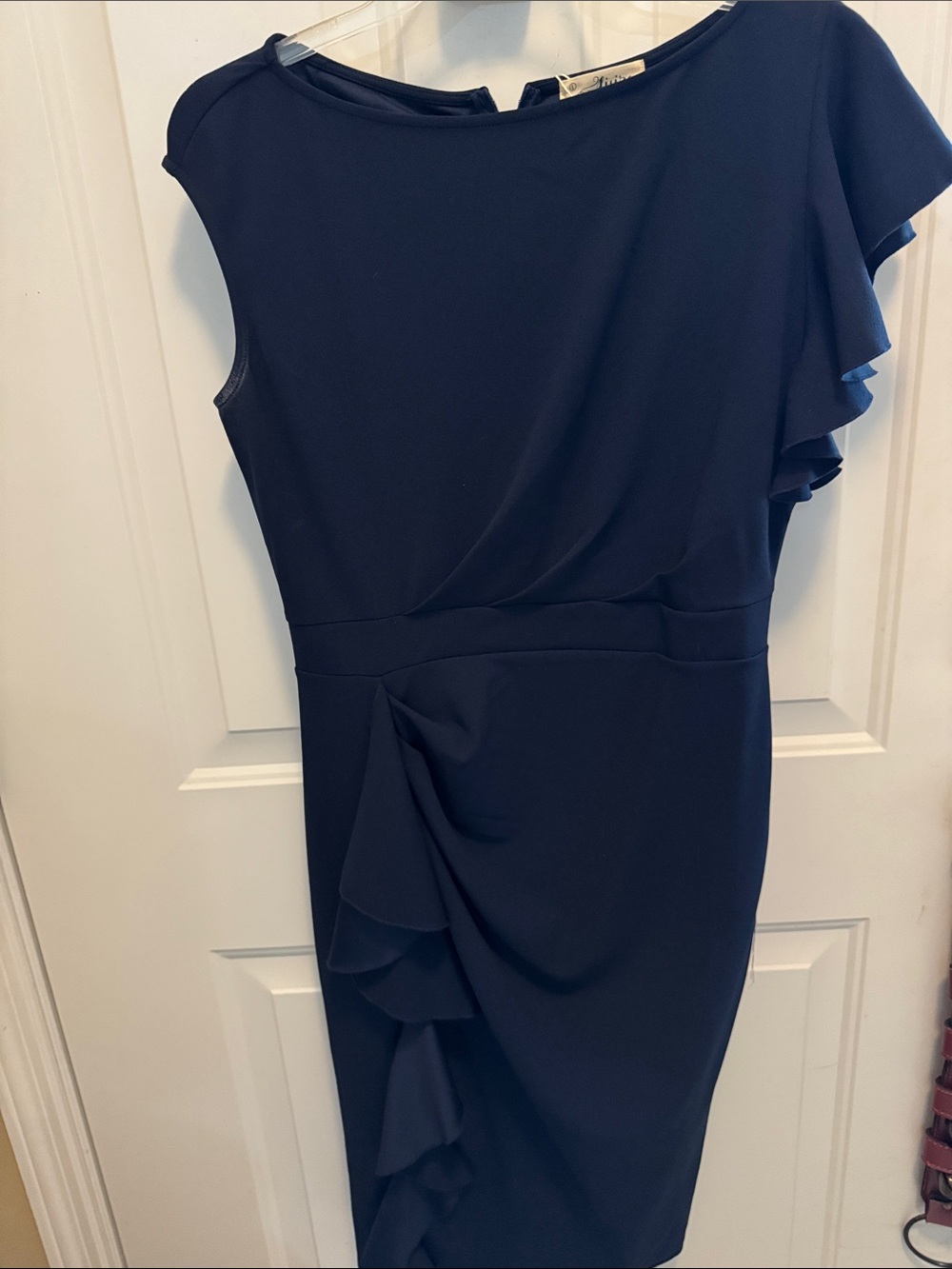 Navy blue pencil dress with asymmetrical ruffle on sleeve & skirt